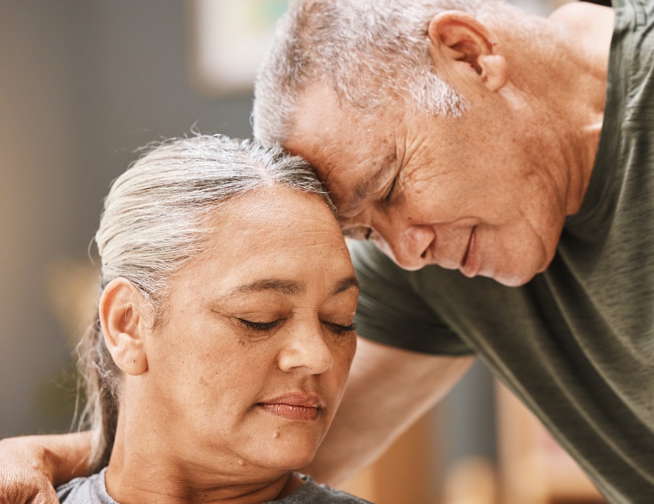 Love, support and senior couple hugging, bonding and spending quality time together at their home. .